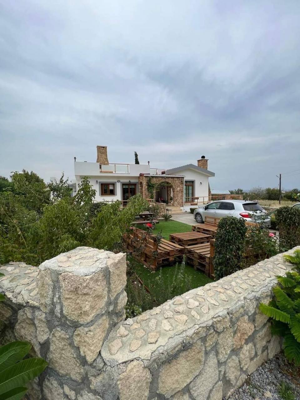 Nordzypern Immobilien 3+1 Stone Villa mit Meerblick in Karşıyaka
